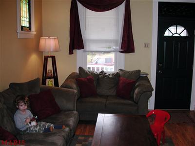 Bad MLS Photo of the Day #26 26 landsdowne 5707 child on couch Bad MLS Photo of the Day #26