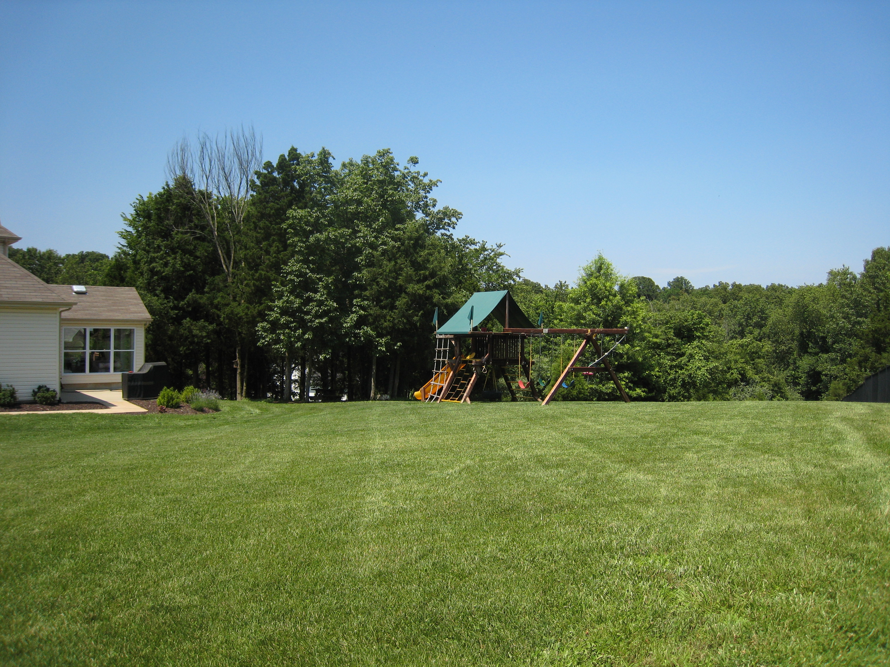 1634 Whispering Hollow Ct - summer backyard